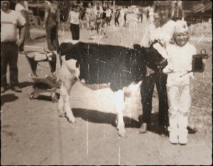 Laura at 11 years old with her first show calf Frisky
